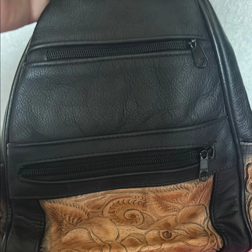 Stylish Black and Brown Backpack with Leather Accents